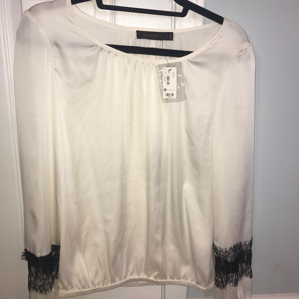 Ivory Silky Blouse with black lace sleeve.